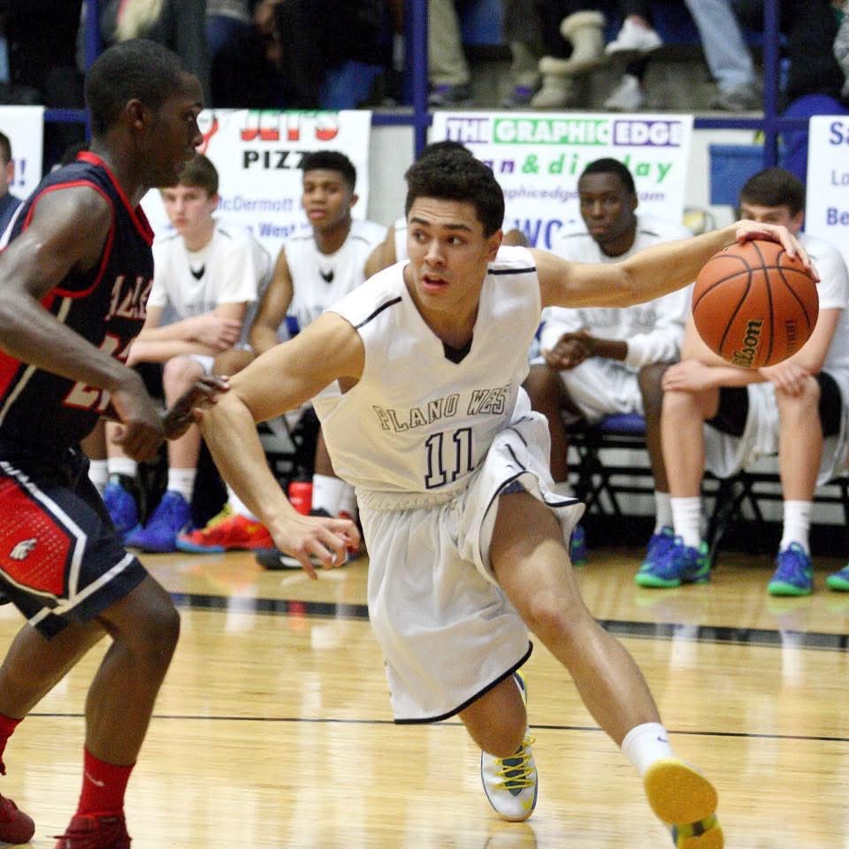 McCann Jr. driving to the basket for Plano West