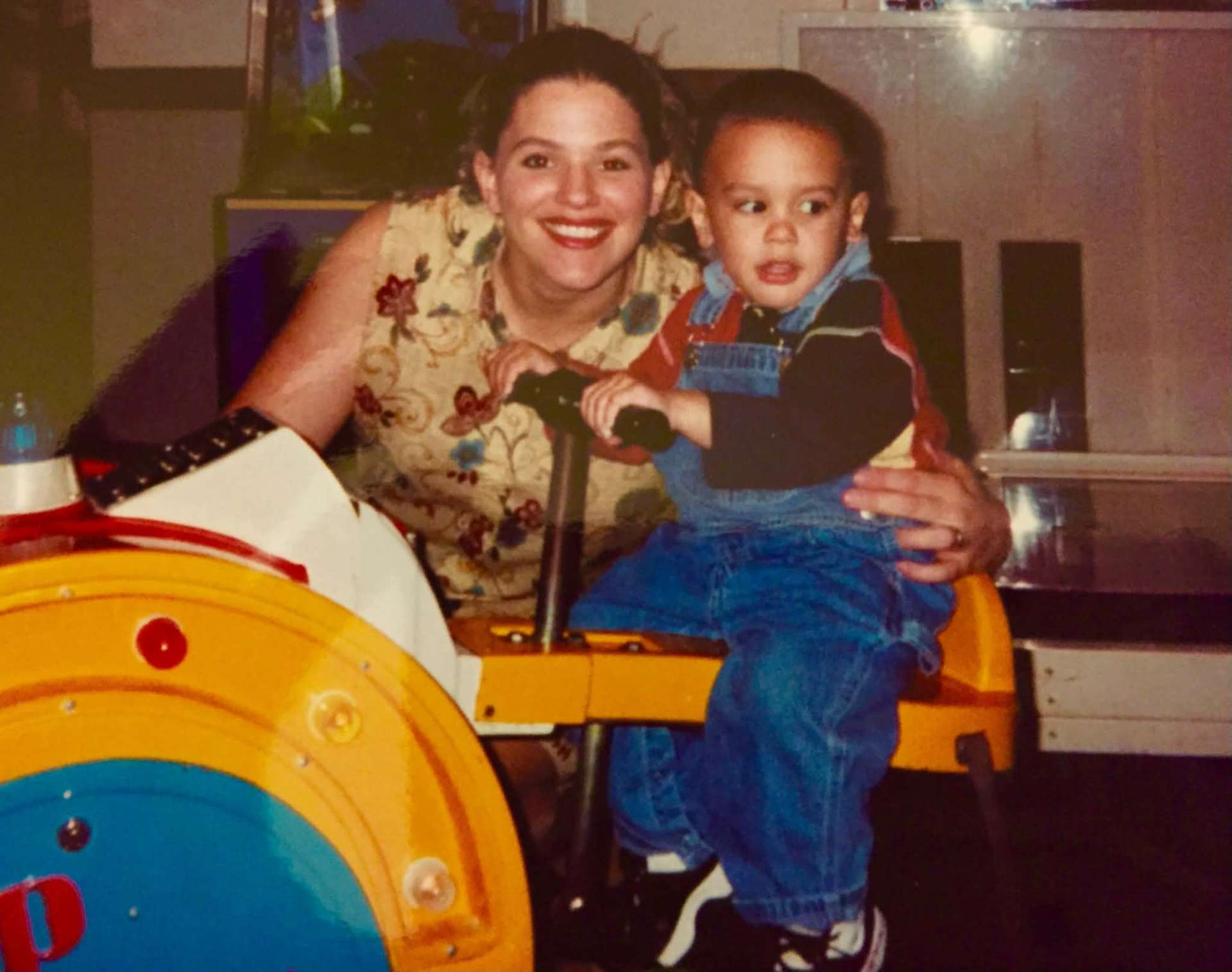 Mom and toddler on a kiddie ride
